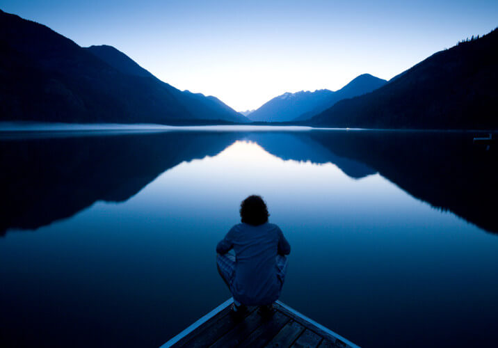 Man Staring at the Lake