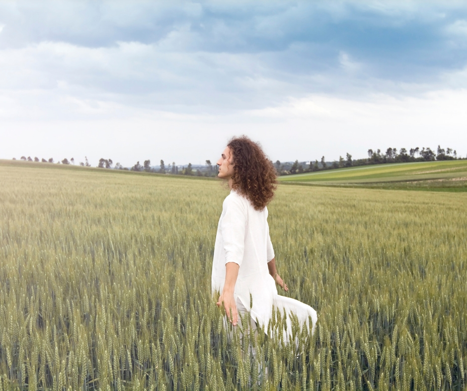 woman in the middle of a cornfield